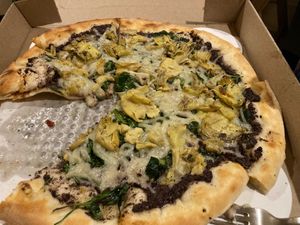 tapenade, artichoke, spinach and vegan mozzarella - delish! at Peekaboo Canyon Wood Fired Kitchen in Kanab