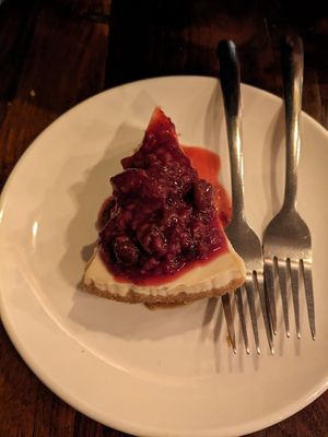 Cheesecake with berry sauce at Peekaboo Canyon Wood Fired Kitchen in Kanab