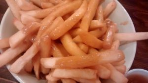 Chips and curry sauce at The  Pakora Bar in Edinburgh