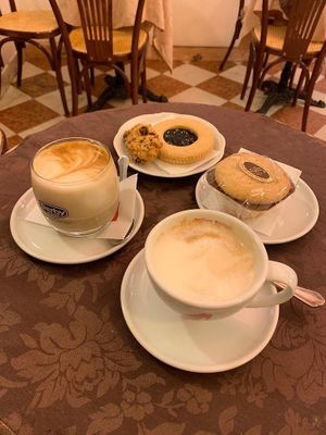 Biscotti, muffin, jam biscuit, latte and cappuccino at Pasticceria Ponte delle Paste in Venice