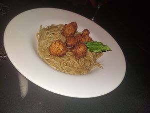 spaghetti with peanut butter sauce and coconut cauliflower  at Black & Blue in Easton
