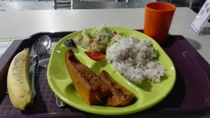 Roasted Pumpkin with herbs, braised cabbage and other veggies, five grains rice, banana and lemon water. at Vegether in New Territories