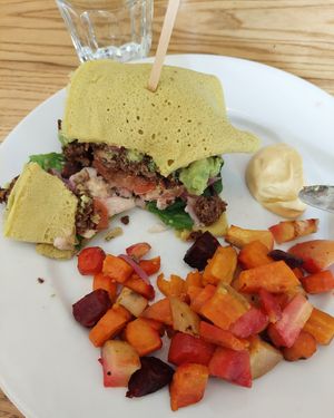 Guacamole burger with roasted root vegetables. at Organico in Stockholm