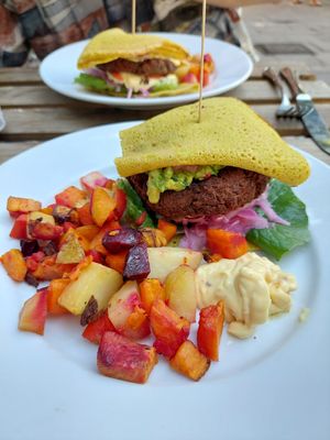 Guacamole burger with roasted root vegetables. at Organico in Stockholm