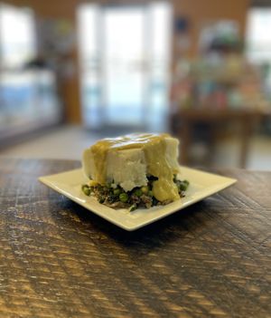 Mosaic Pie. Mashed potatoes (with Earth Islands Sour cream), corn and peas over Walnuts & Kale topped with a Cheezy (nutritional yeast) sauce.  #Veganuary at Mosaic Market in Windsor