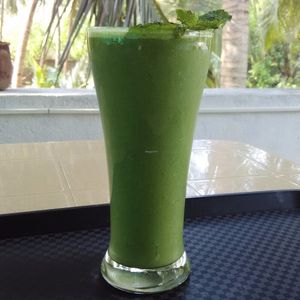 Green Smoothie with almond milk. at Veganza Cafe in Auroville