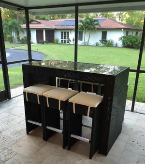 Looking from your private lanai to the main house at Pirate Palms Plant-Centered Retreats in Naples