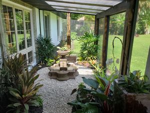 Entrance at Pirate Palms Plant-Centered Retreats in Naples