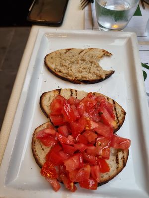 Mushroom and tomato bruchetta already started. (Amazing) at Origano Campo de' Fiori in Rome