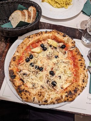 Vegan pizza with artichoke, olives and mushroom at Origano Campo de' Fiori in Rome