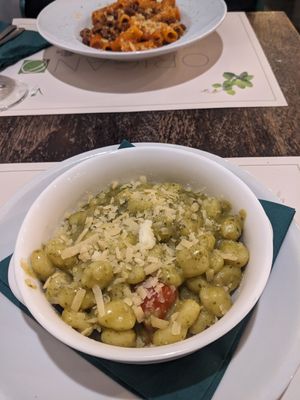 Vegan pesto gnocchi and tomato rigatoni with vegan bacon! at Origano Campo de' Fiori in Rome