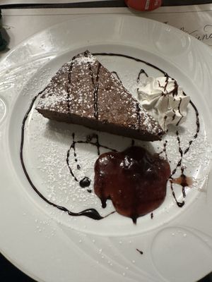 Vegan chocolate cake with cream and jam  at Origano Campo de' Fiori in Rome