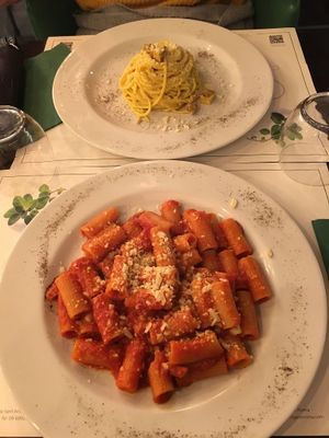 Pasta with tomato sauce and vegan "bacon" at Origano Campo de' Fiori in Rome