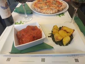 Meatballs and roast potatoes with chicory - delicious! at Origano Campo de' Fiori in Rome