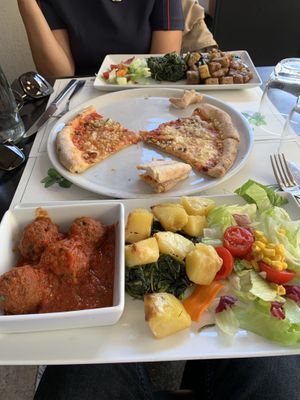 2 vegan meat dishes and pizza diavola vegan  at Origano Campo de' Fiori in Rome