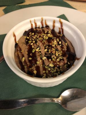 Chocolate mousse with salted caramel and pistachio  at Origano Campo de' Fiori in Rome