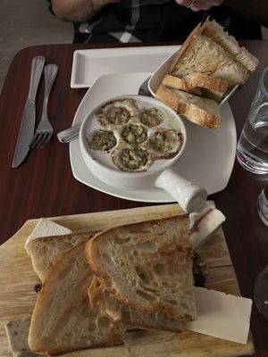 Vegan escargot and cheese plate for the table  at Delice & Sarrasin in New York City