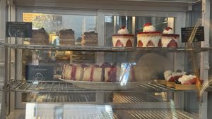 Fraisier cake is as good as the show was. But I don’t know what to do with these tossed salads and scrambled tofu    at Delice & Sarrasin in New York City