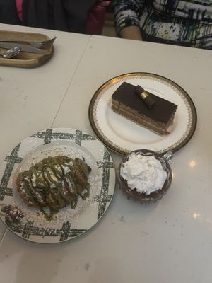 Pistachio Chocolate croissant, chocolate mouse, and opera cake  at Delice & Sarrasin in New York City