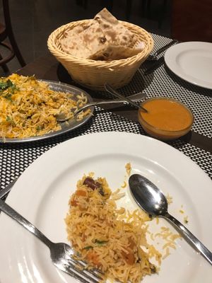 Kind, attentive, tasty and 100% plant based options. Whole flour naan + bryani  at Masala House in Portimao