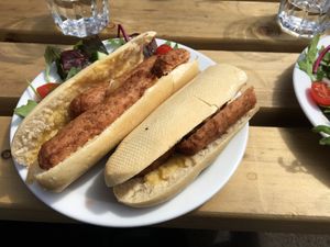 Vegan hotdog with onion  at Plant by Kat's Kitchen in Keswick