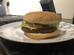 Quarter Pounder Style Burger with Vegan Cheese  at Veggie Supreme in Wolverhampton