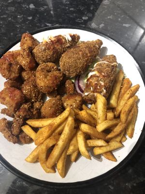 Moroccan Cauliflower Bites, Crispy Jackfruit Wings and Peri Peri Fries  at Veggie Supreme in Wolverhampton