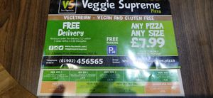 front of the menu at Veggie Supreme in Wolverhampton