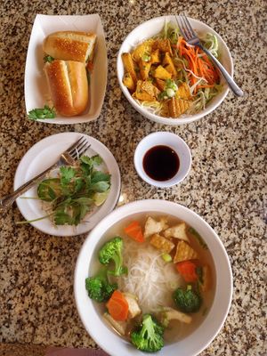 Top left is the tofu bahn mi, top right is the tofu vermicelli, bottom is tofu and broccoli pho. at Pho Pier 77 in Panama City Beach