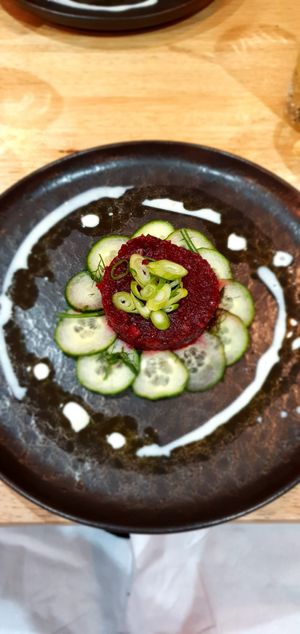 Beetroot tartare served on a cucumber carpaccio with a kefir and dill dressing at The Allotment in Manchester