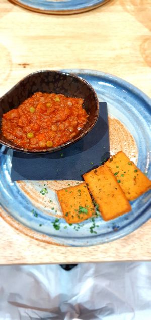 Traditional Italian lentil ragu served with panelle at The Allotment in Manchester