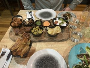 Platter and chunky chips(these are amazing! I know they’re only chips, but 😍) aubergine rolls in the background  at The Allotment in Manchester