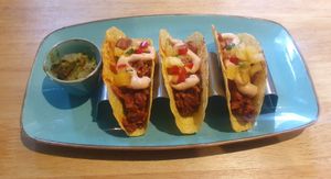 Jackfruit Tacos - Tacos filled with tex mex braised jackfruit, served with guacamole, chipotle mayo & fresh pineapple salsa at The Allotment in Manchester