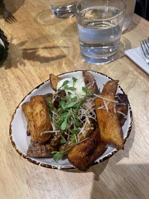 Garlic and truffle hand cut chips  at The Allotment in Manchester