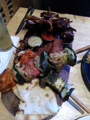 Shared platter with grilled tofu/veggies, polenta fries and leek bahji at The Allotment in Manchester
