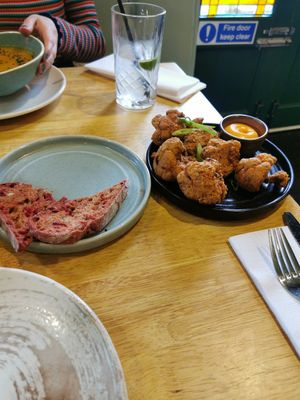Soup with bread (left) and cauliflower wings (right) at The Allotment in Manchester