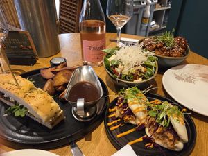 Bao buns, cashew noodles salad, cauli, focaccia sandwich with wedges n gravy at The Allotment in Manchester