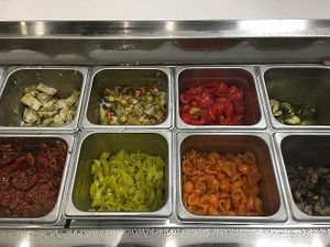 So many amazing veggie toppings to choose from! Add them all! at Doughocracy in Geneva