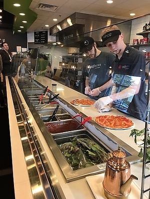 Made-to-order pizzas at Doughocracy. Ask for a "glove change" and they will use fresh gloves plus wipe down the prep area to make sure your pizza is vegan. Get "salad on top" too! at Doughocracy in Geneva