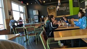 Please eat pizza with a pleasant person. at Doughocracy in Geneva