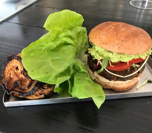 RAW burger with sprouted bun instead of lettuce wrapped  at Raw Remedy in Palm Springs