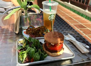 Western burger and dehydrated onion rings  at Raw Remedy in Palm Springs