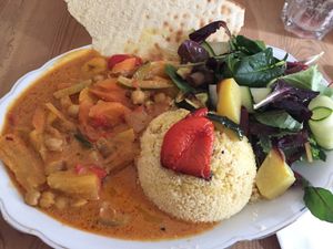 Veg curry with couscous and salad at Ataya Caffe at ATAYA in Berlin