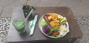 Bowl with veggies and smoothie at ATAYA in Berlin