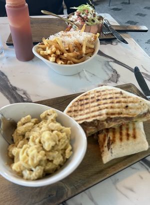 crunch wrap (side of mac), loaded mac (side of truffle fries)  at Parlor City Vegan in Binghamton