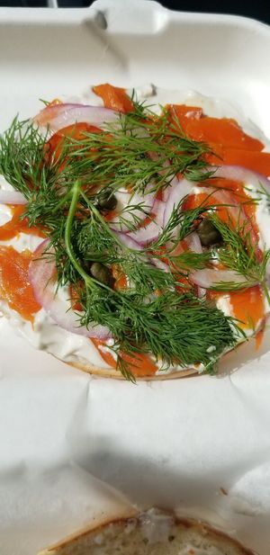 Lox of Love. Toasty bagel with cream cheese, local dill, red oniom and capers at Parlor City Vegan in Binghamton
