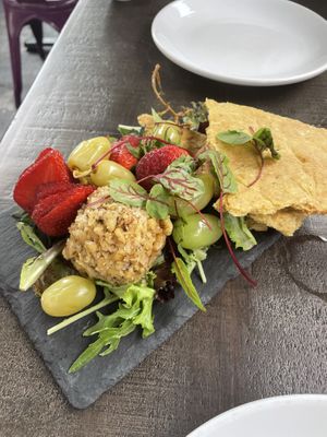 Cheese plate, looks nice but the Brie tasted nothing and the pickled grapes was disgusting and took over all flavors  at Modern Love in Brooklyn