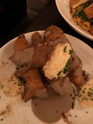 half eaten Truffled Poutine at Modern Love in Brooklyn