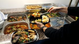 The main part of the asian buffet including green beans, spring rolls, filled tomatoes and fried eggplant. at Butterfly in Basel