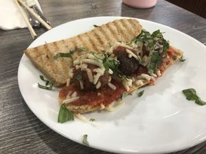 Meatball parm hero- delicious and satusfyug meatballs with house made marinara sauce, Parmesan. *served on our gf hero   at The Pureganic Cafe in Harrison